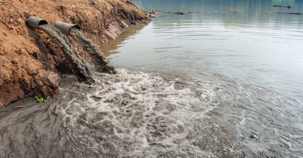 A thick layer of wet brown sludge covers the ground, showing ridges, cracks, and uneven textures across the frame.